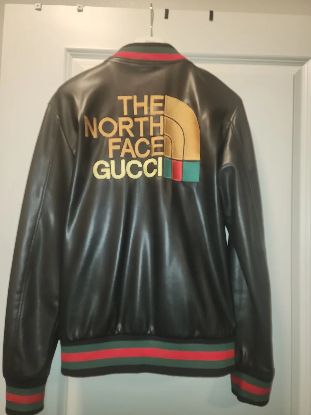 Gucci Black Leather Bomber Jacket with Gold Logo and Red-Green Trim